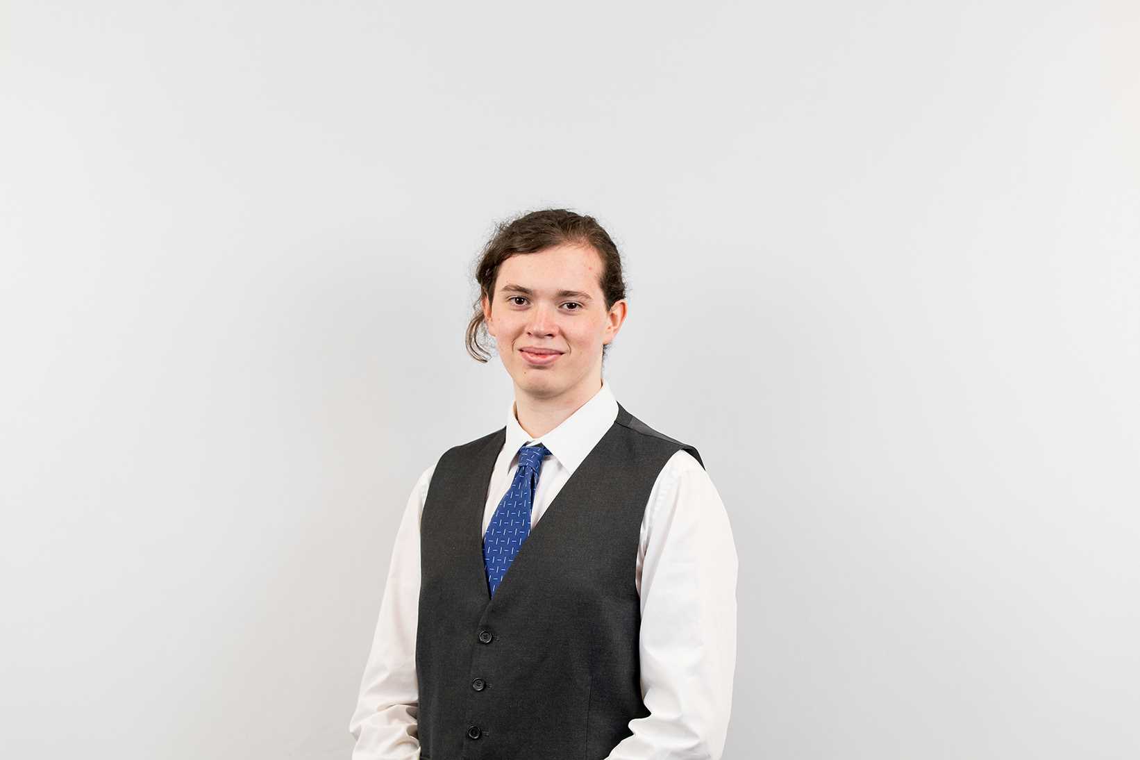 Photo of Matthew at our awards ceremony, posing against a plain background.
